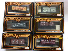 Mainline OO gauge rolling stock including Hopper, Coke and 7 Plank wagons, all boxed (25)