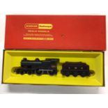 Triang Hornby OO gauge LMS black 4-4-0 Class 2P Fowler locomotive with tender 690, R450, SR 4-4-0 L.