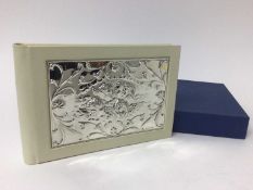 Carrs silver fronted photos album, decorated with winged cherubs - boxed