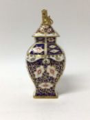Royal Crown Derby Imari vase and cover, of square baluster form, with lion knop, 25cm high