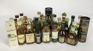 Miniatures - thirty three bottles, to include The Macallan 10 year old, boxed, Glenfiddich, Bushmill