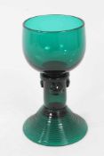 A George III green tinted wine glass, in German style