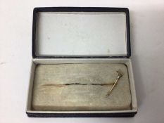 Victorian gold and silver stock pin in the form of a riding crop, c.1890.