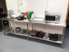 A wall standing stainless steel preparation with under shelf, 2800 mm