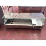 A Polar stainless steel table top refrigeration display unit, with glass sneeze screen, cable and pl