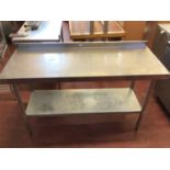 A wall standing stainless steel preparation bench, with shelf under, 1500 mm
