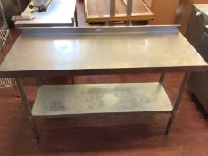 A wall standing stainless steel preparation bench, with shelf under, 1500 mm
