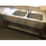 A stainless steel double bowl sink unit, with mixer tap and undershelf, 1500 mm