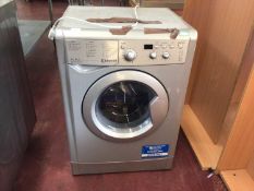 An Indesit WDD71535 washing machine, together with a Zanussi ZDC 46130W dryer, cables and plugs