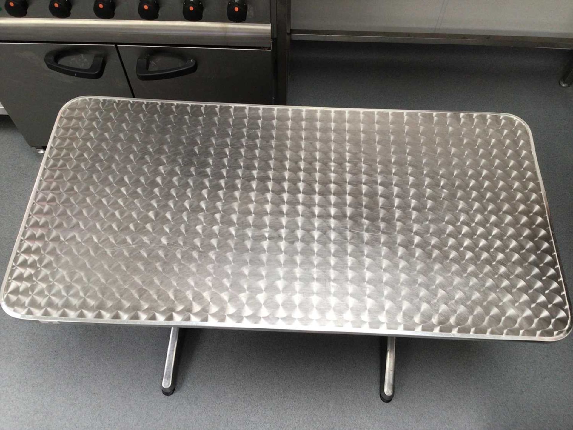 A brushed stainless steel rectangular top table, with plated column pedestals, 1200 mm x 600 mm - Image 2 of 2