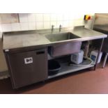 A stainless steel single bowl sink unit, with two taps, integral cabinet and shelf under, 1800 mm