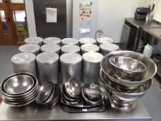 A selection of stainless steel mixing bowls, serving dishes and brushed metal storage containers (qt