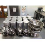 A selection of stainless steel mixing bowls, serving dishes and brushed metal storage containers (qt