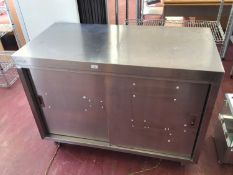 A stainless steel freestanding cabinet, with two sliding doors, on castors, 1200 mm