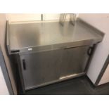 A Corsair Hotlock stainless steel preparation bench, with double sliding doors, 1210 mm