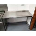 A wall standing stainless steel preparation bench, with under shelf, 1300 mm