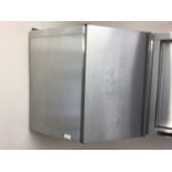 A stainless steel corner wall cabinet, with single door, 660 mm wide x 660 mm deep