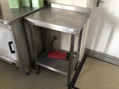A wall standing stainless steel preparation bench, with undershelf, 600 mm