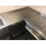 A stainless steel corner wall mounted preparation bench, with undershelf, 1210 mm
