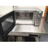 A Buffalo GK643 stainless steel microwave oven, cable and plug