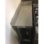 A stainless steel corner preparation bench, with undershelf, 300 mm wide x 810 mm deep