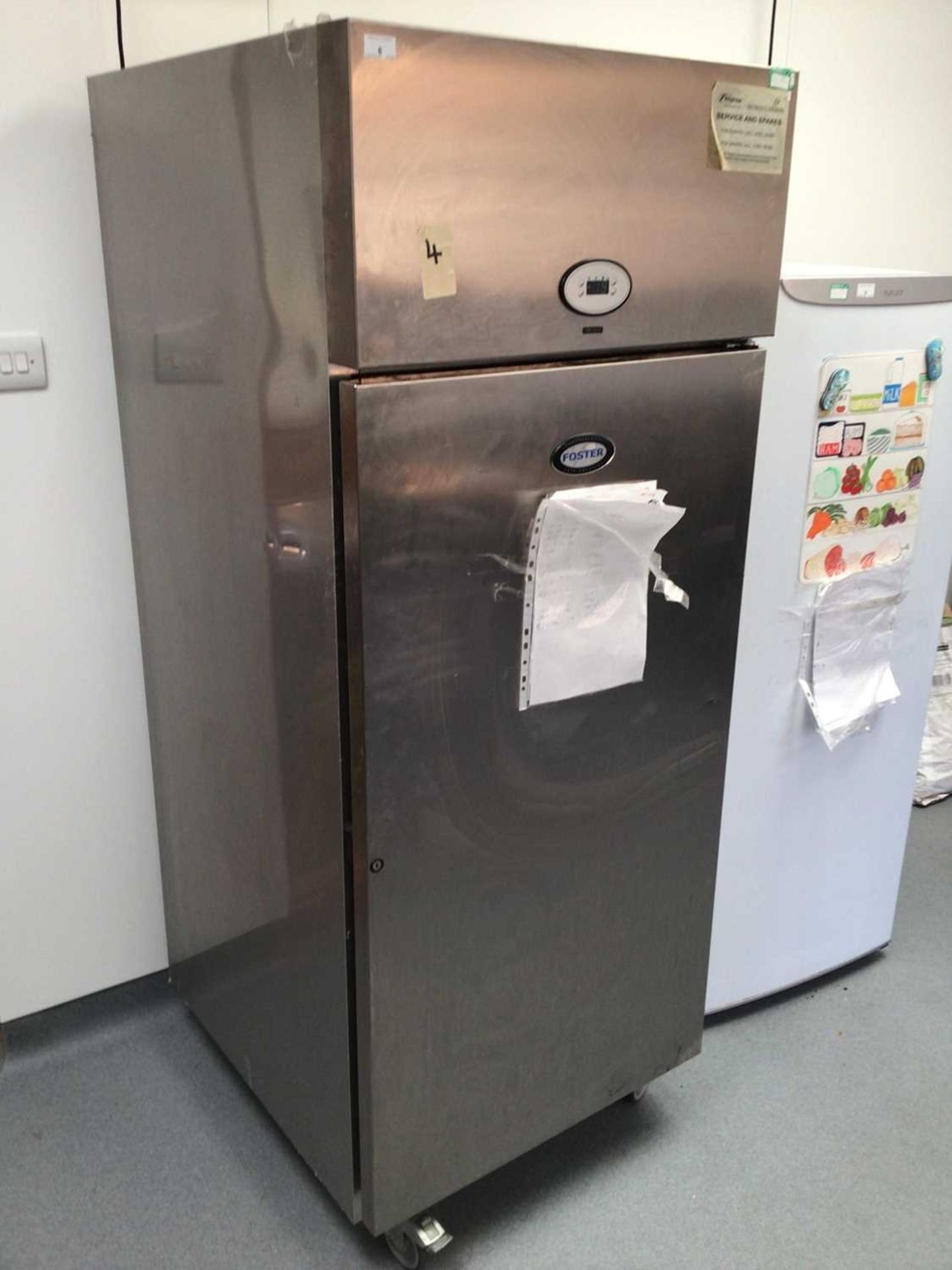 A Foster stainless steel freezer, on castors, cable and plug
