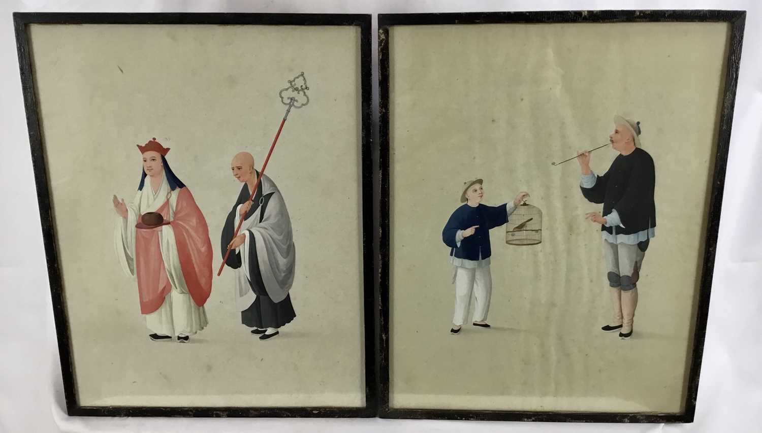 Two antique Japanese gouache works on paper - priest figures and boy with a bird cage, both 27cm x 3
