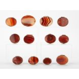 Grp: 12 Red Agate Snuff Boxes