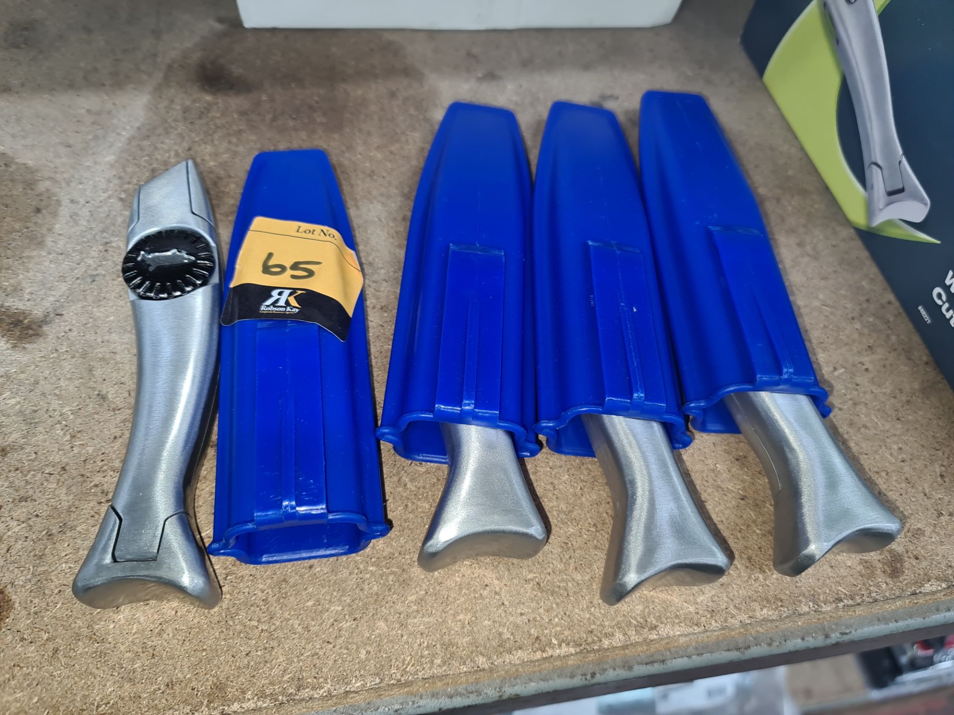 4 off silver metal knives with Dolphin symbol, each including a plastic case. NB this lot consists