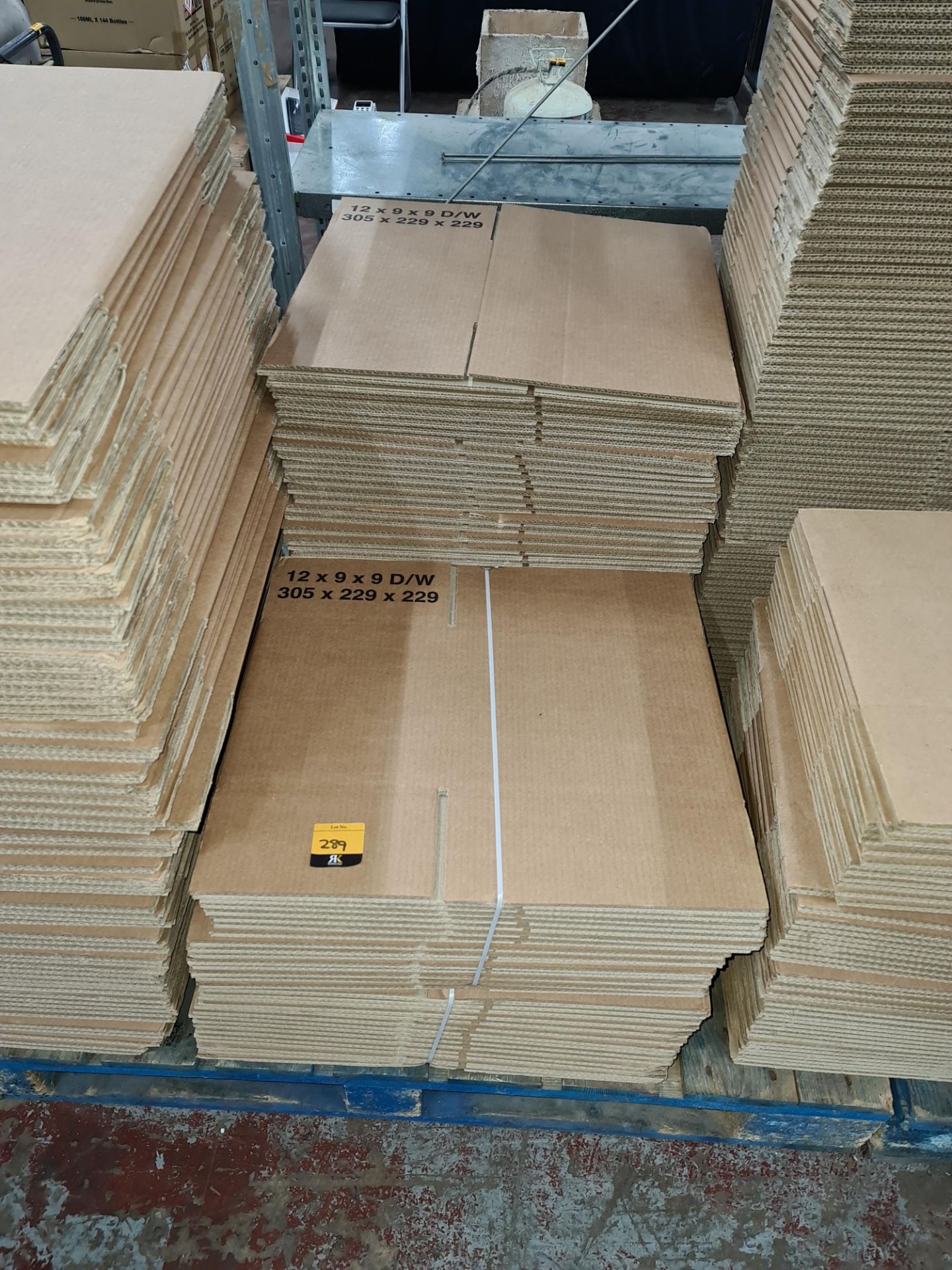 4 bundles of flatpack cardboard boxes each measuring 305 x 229 x 229. NB this lot also includes a