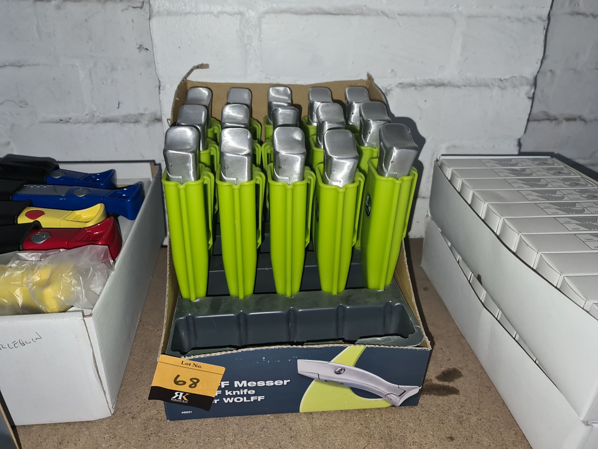15 off Wolff silver finish knives each with a green plastic case. NB this lot consists of handles
