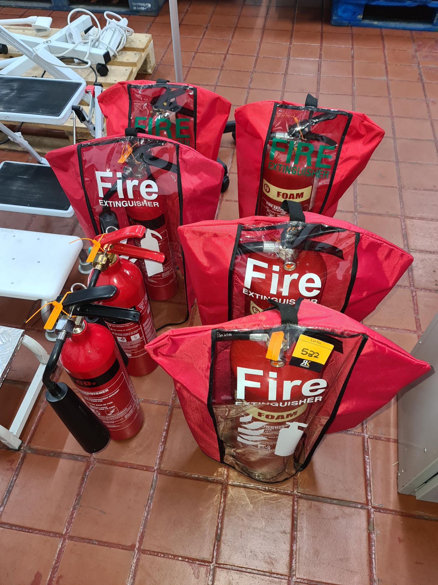 7 off assorted fire extinguishers, of which 5 include a removable cover