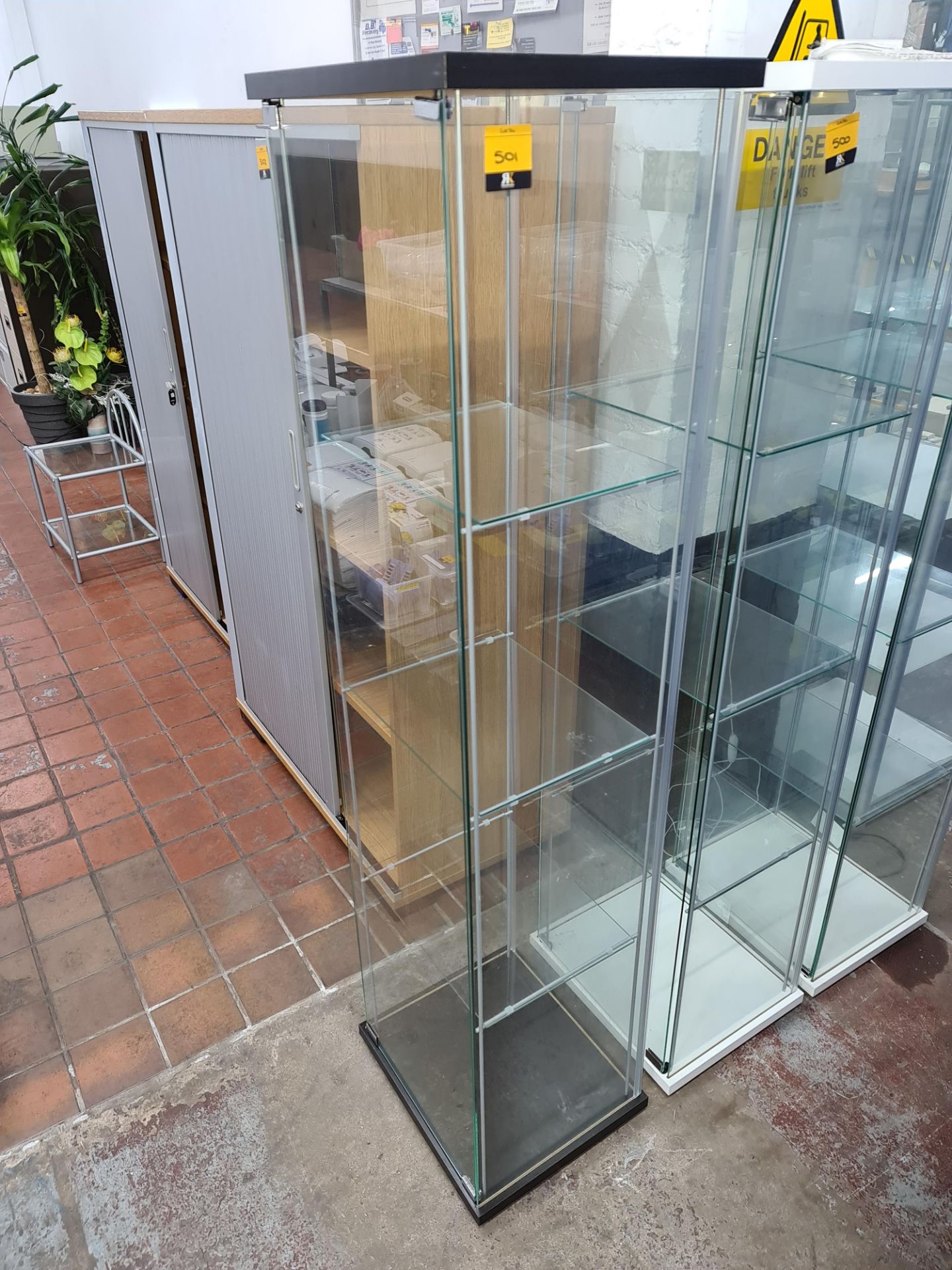 Glass display cabinet - black plinths to top & bottom