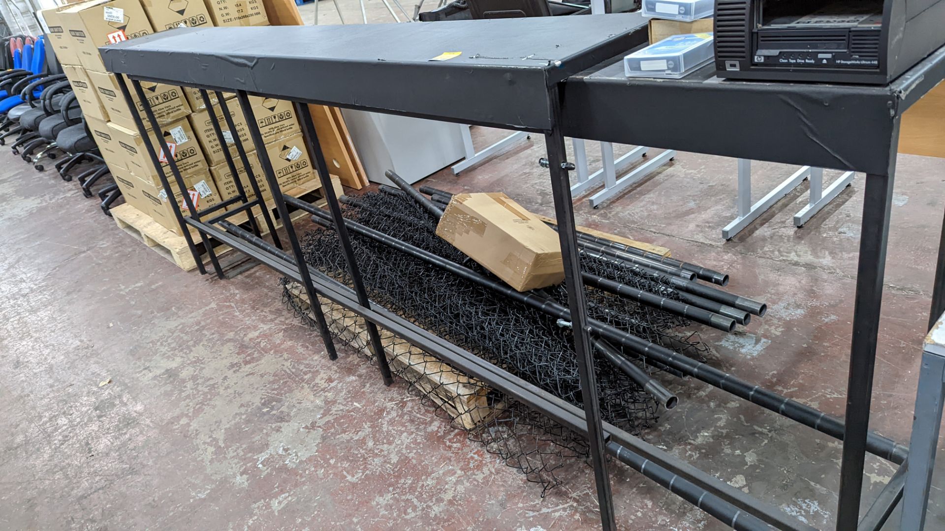 2 off metal long narrow tables plus quantity of poles & netting