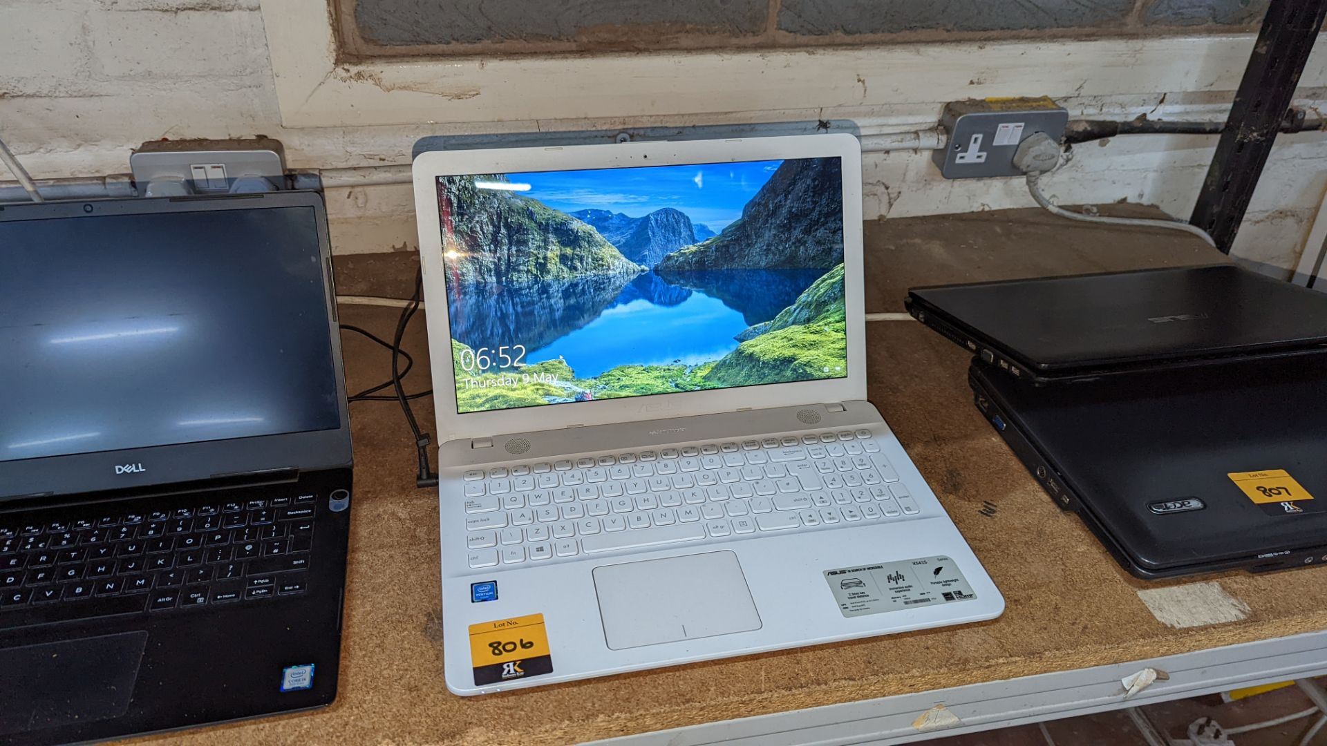 Asus model X5415 white notebook computer with Pentium processor & 4GB RAM. This lot also includes a