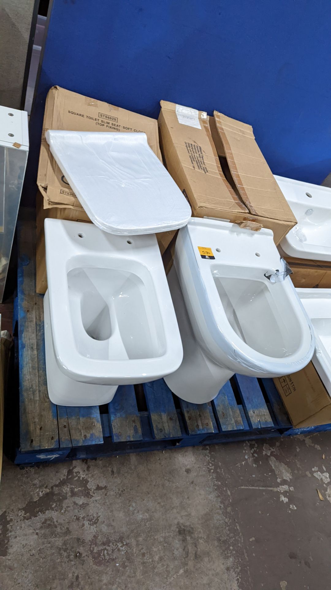 Pair of assorted toilet pans, one of which includes a seat - Image 9 of 10