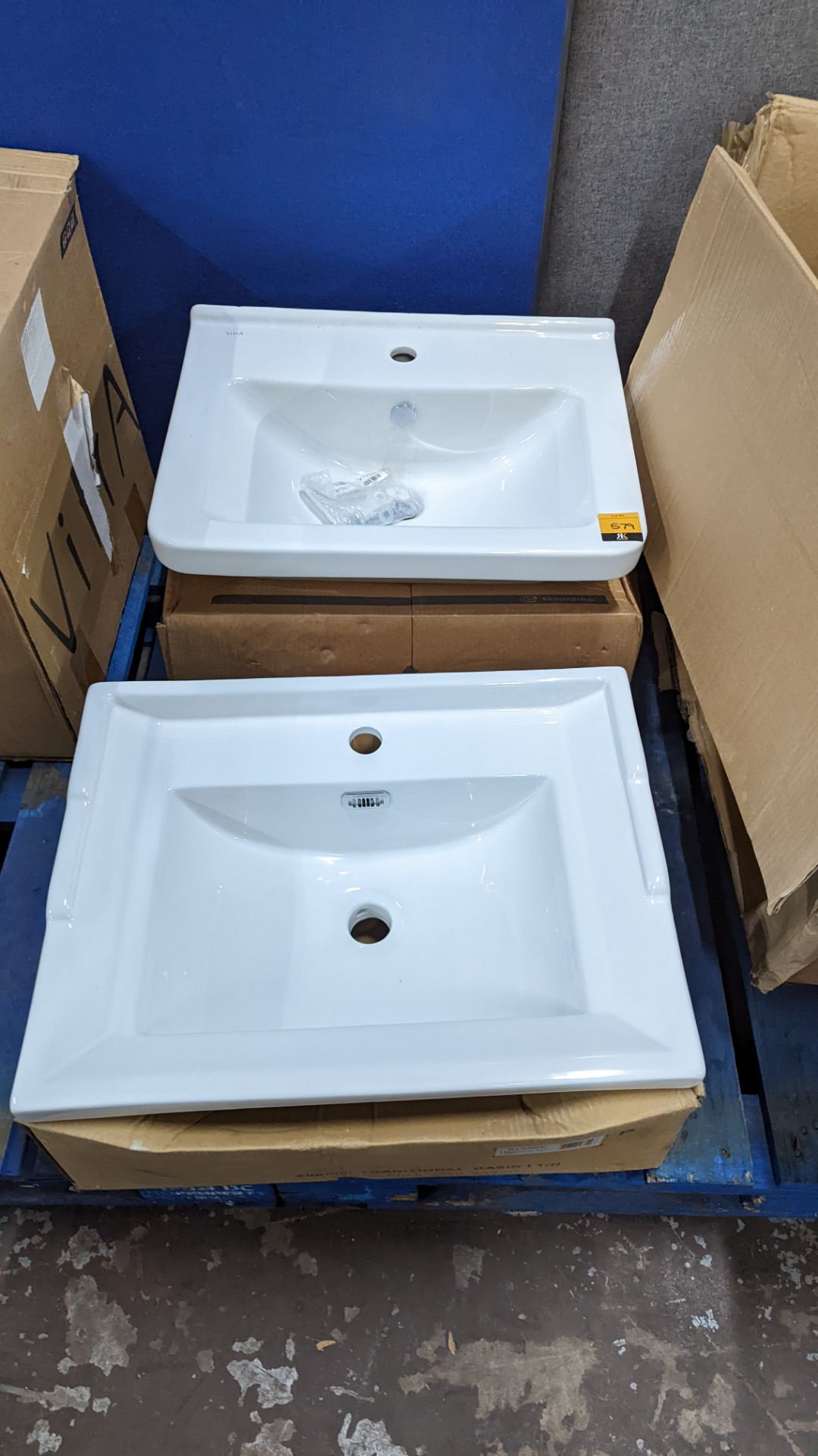 Pair of assorted white basins