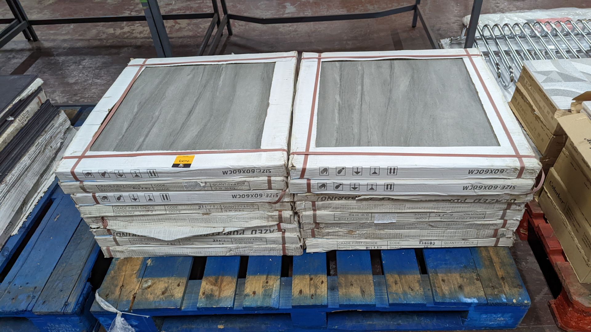 16 boxes of large grey patterned glazed porcelain tiles, each tile measuring 60cm square. Each box h