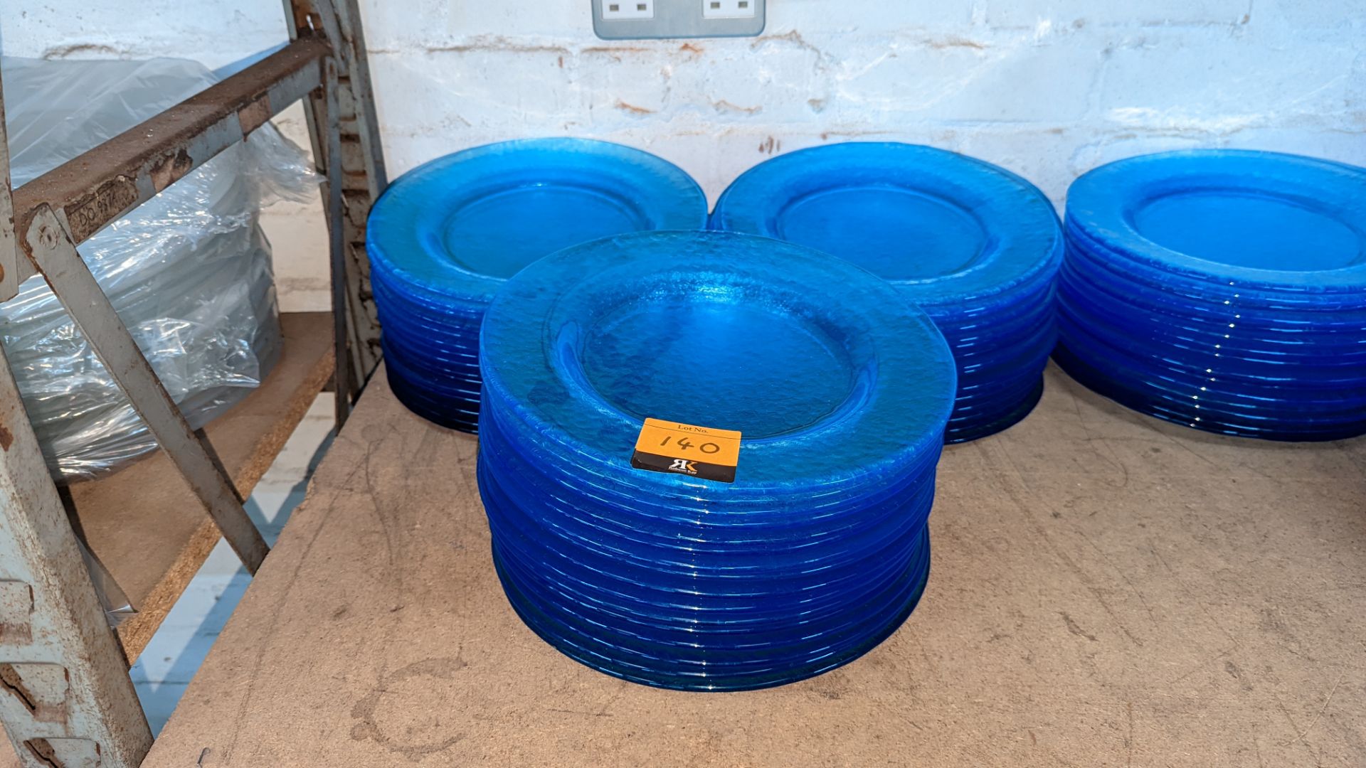 45 off blue glass plates each measuring approximately 275mm diameter (3 stacks)