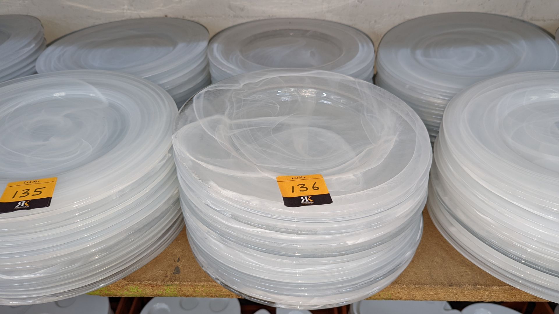 30 off large clear/white patterned glass plates, each measuring approximately 330mm diameter