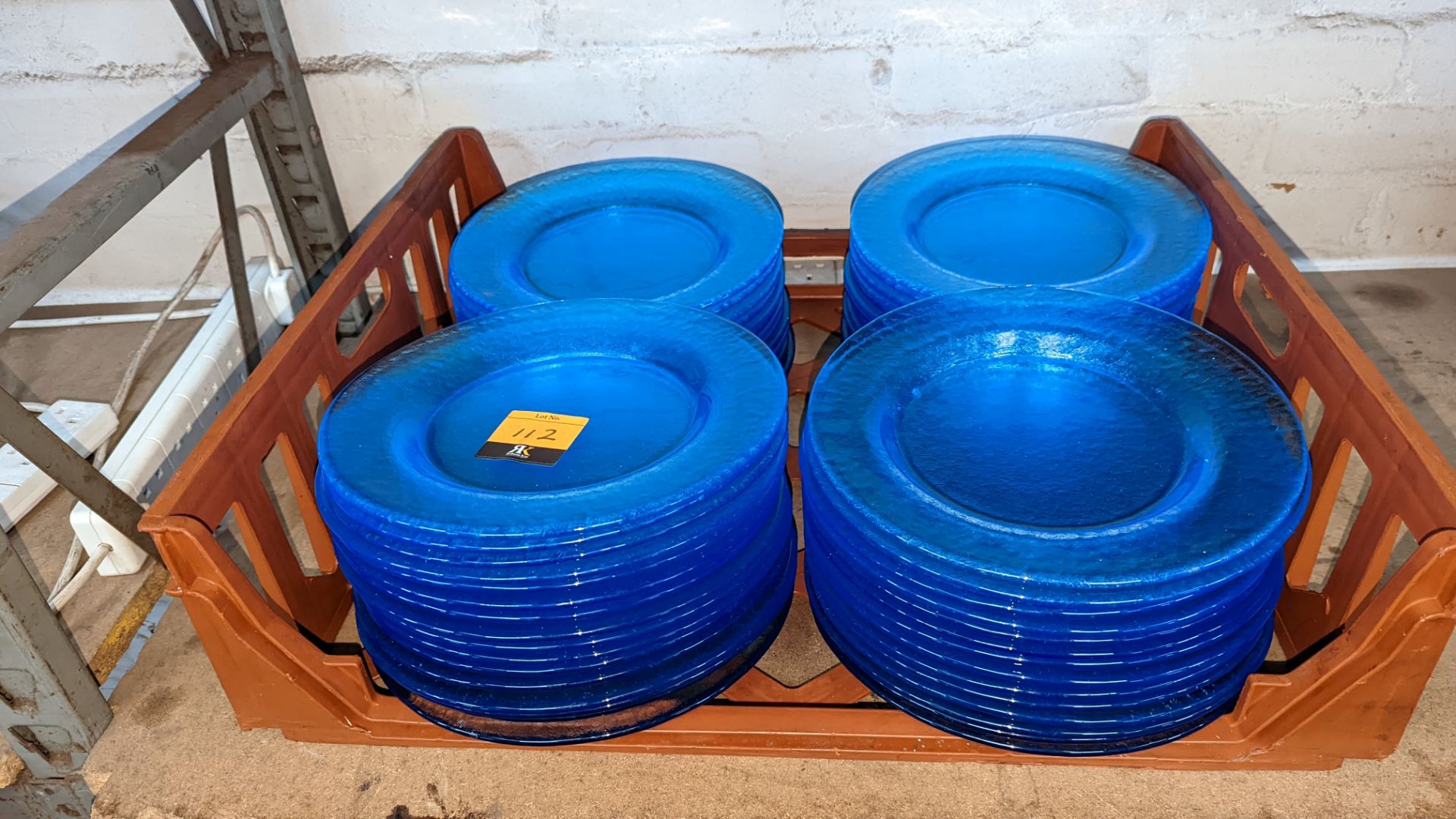 60 off blue glass plates each measuring approximately 26cm diameter