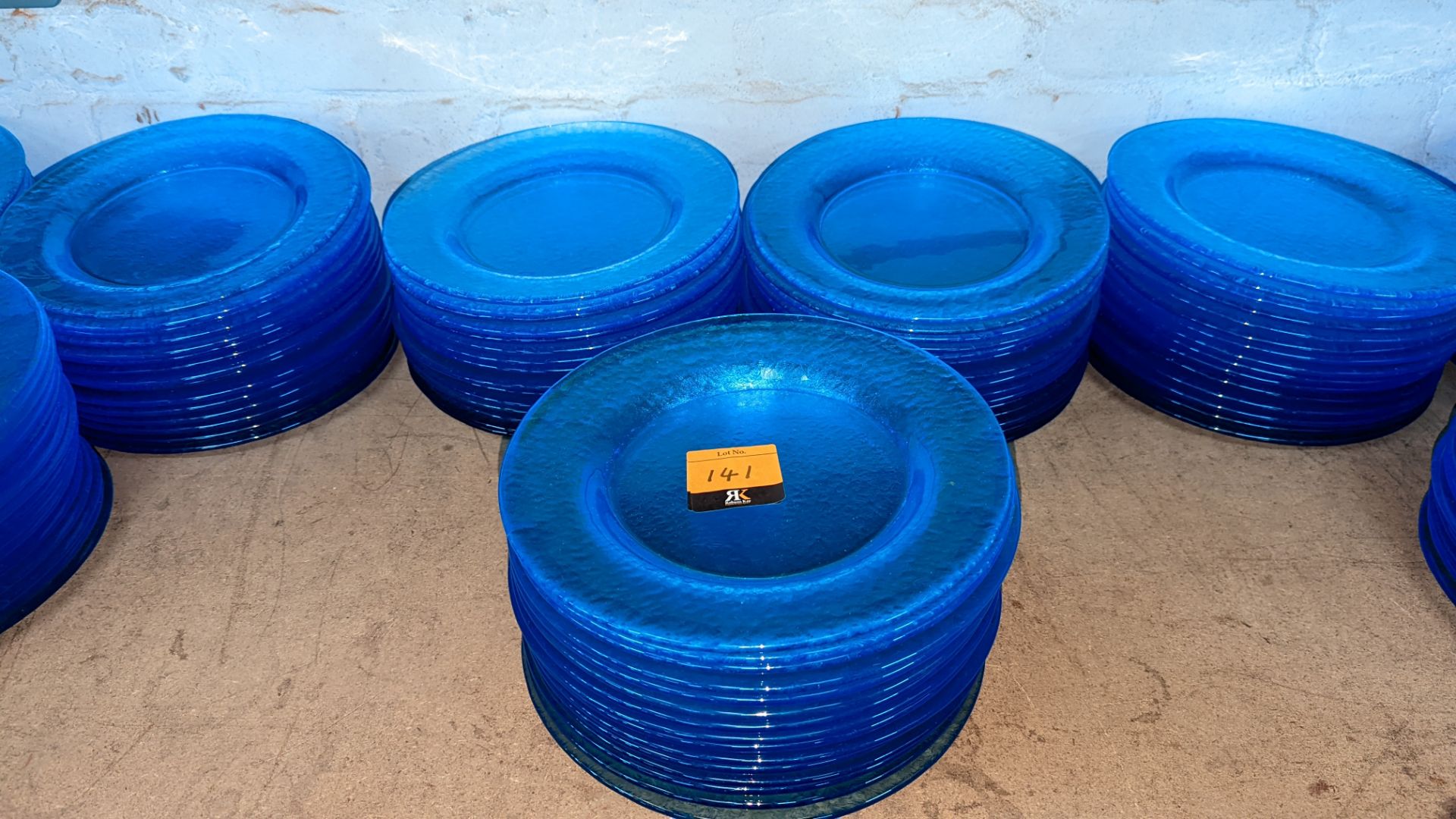 45 off blue glass plates each measuring approximately 275mm diameter (3 stacks)