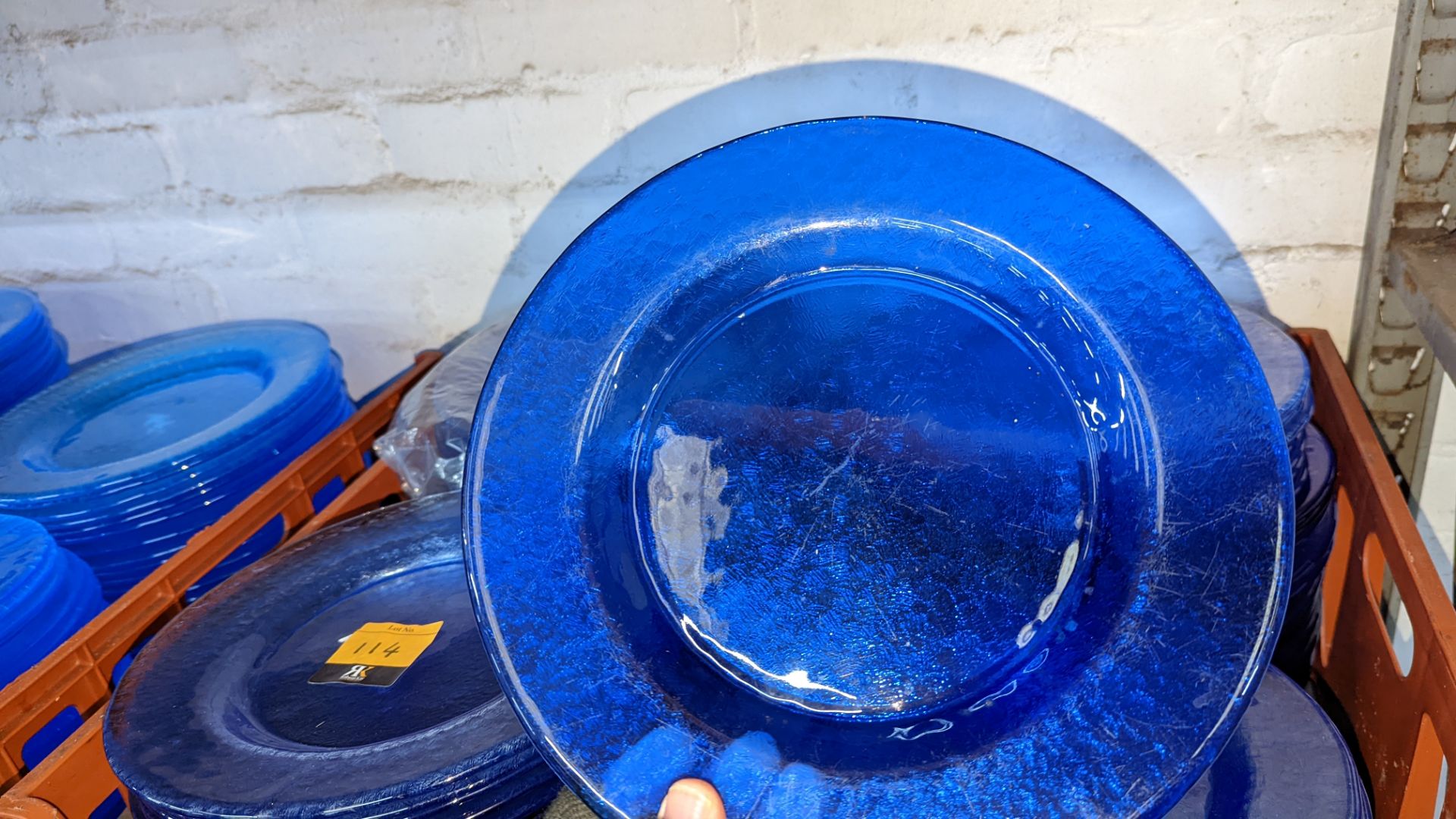 Approximately 90 blue glass plates, each approximately 26cm diameter. NB all of the plates are a da - Image 4 of 4