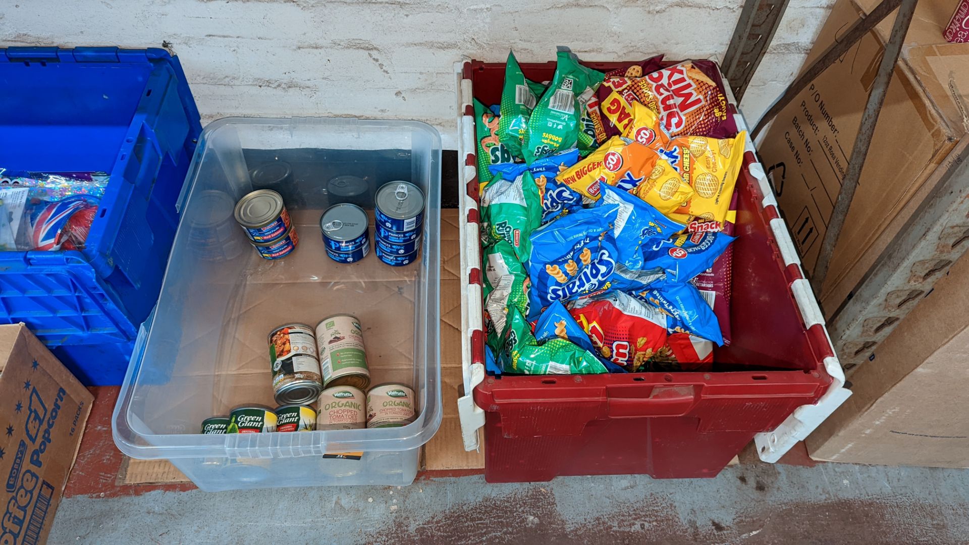 Mixed food lot comprising the contents of a crate of canned food & the contents of a crate of crisps