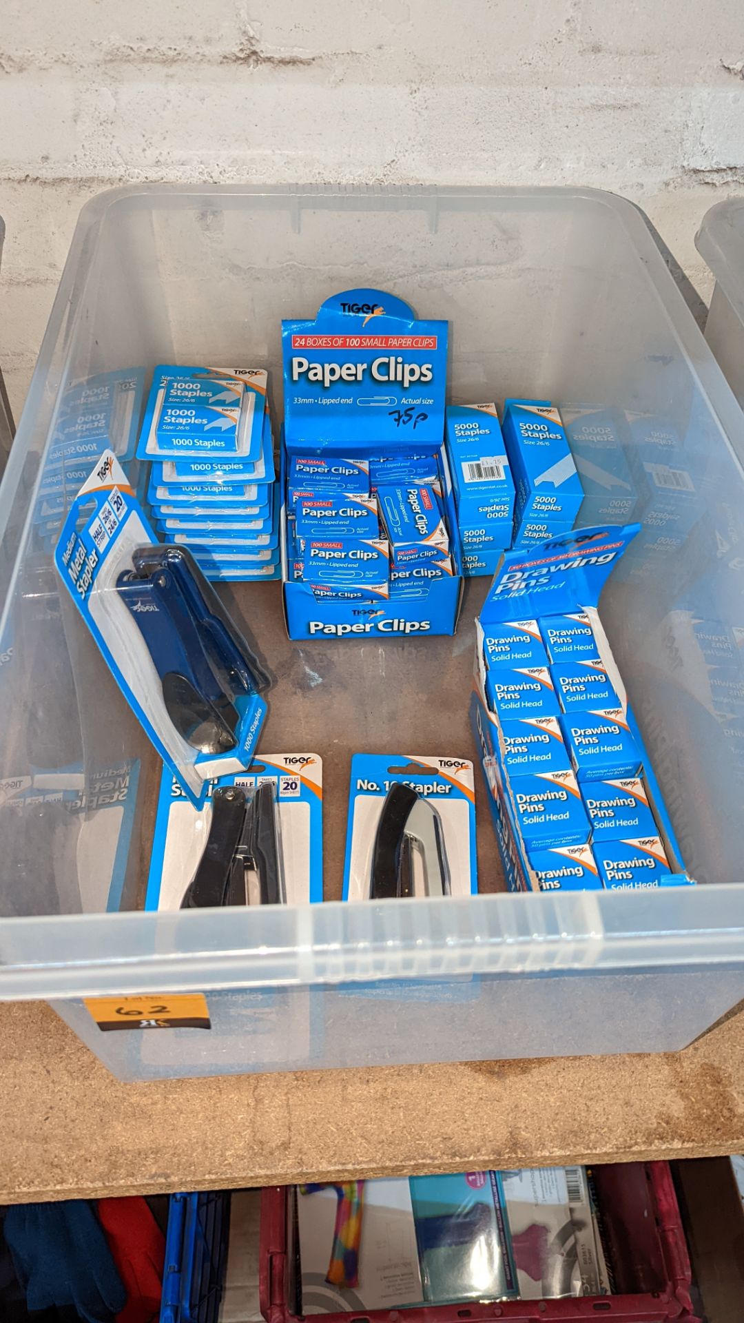 Contents of a crate of paper clips, staples, drawing pins, staplers & more - crate excluded