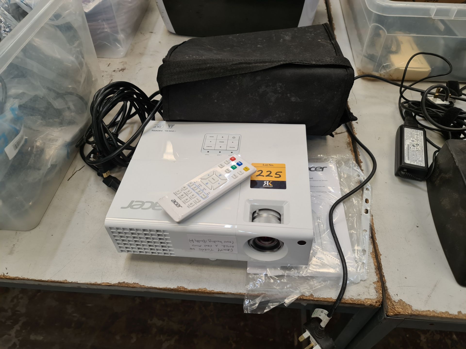 Acer projector model P1173DLP/QSV1308. Marked "faulty". Includes remote, book pack & carry case