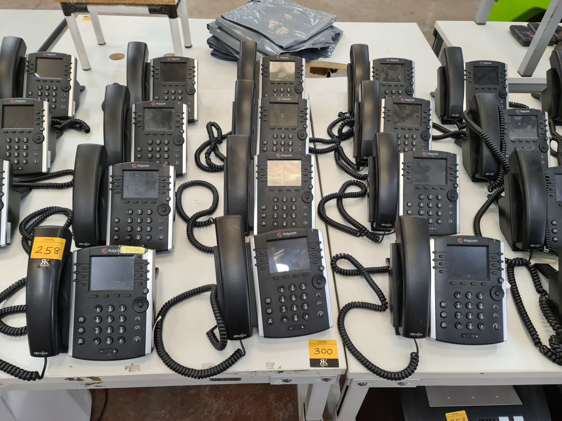 12 off Polycom model VVX411 telephone handsets