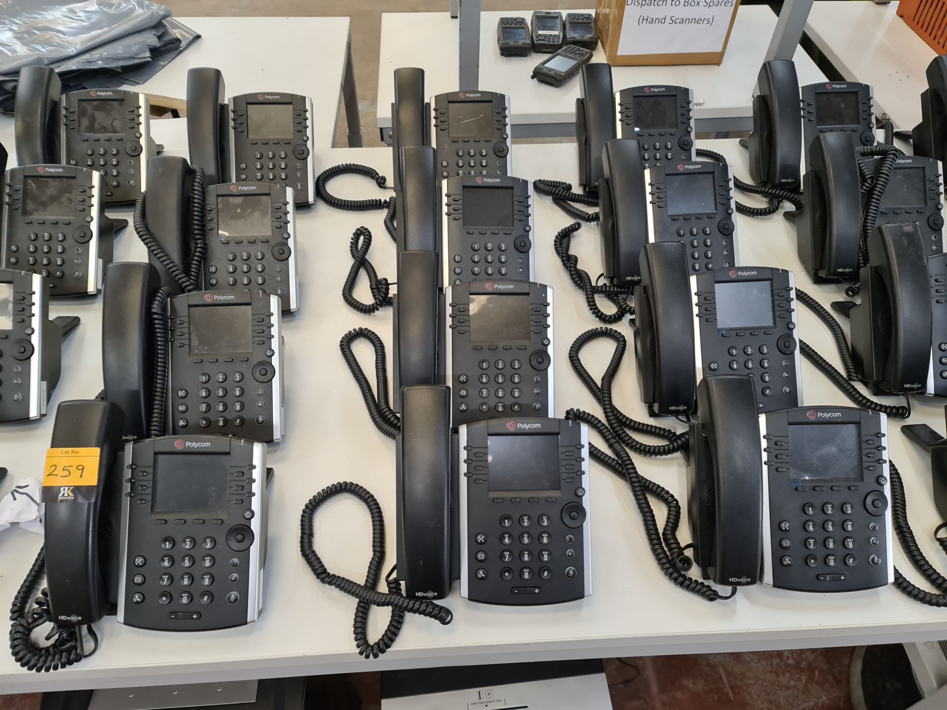 12 off Polycom model VVX411 telephone handsets