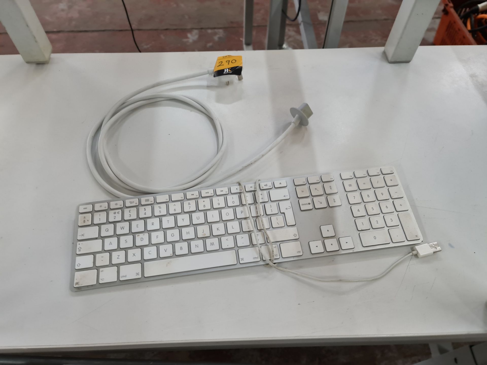 Apple keyboard plus Apple power adaptor