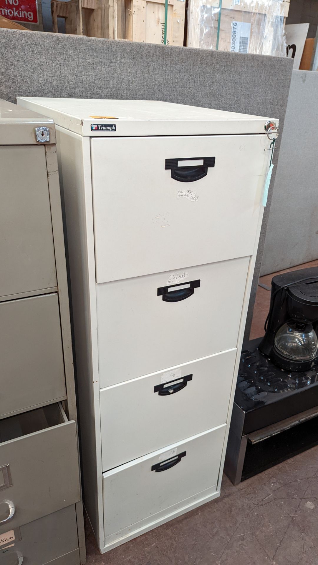 Pale grey metal 4-drawer filing cabinet